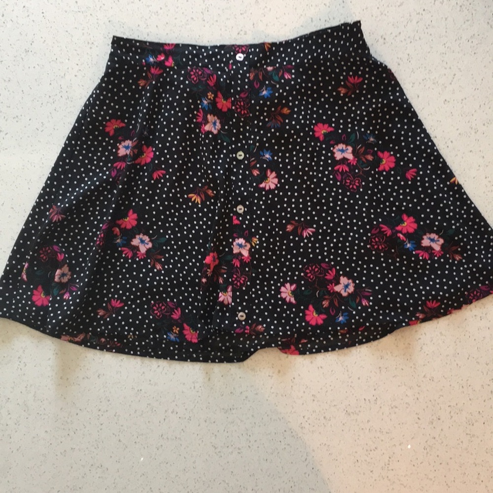 Polka dot and floral print mini skirt